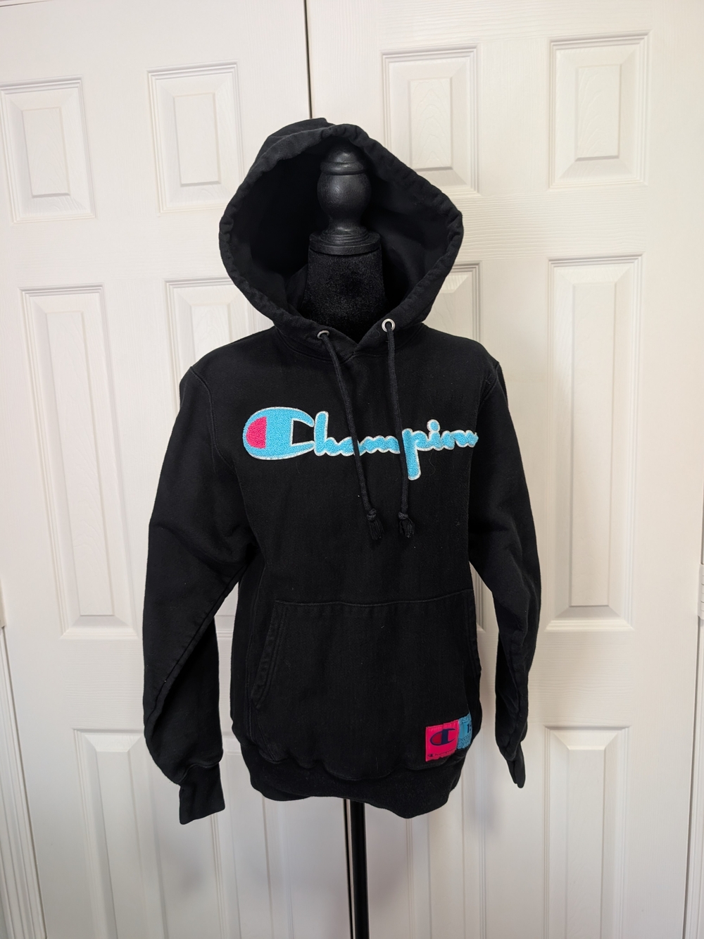 Champion Black Hoodie with Aqua Script Logo and Pink Accent